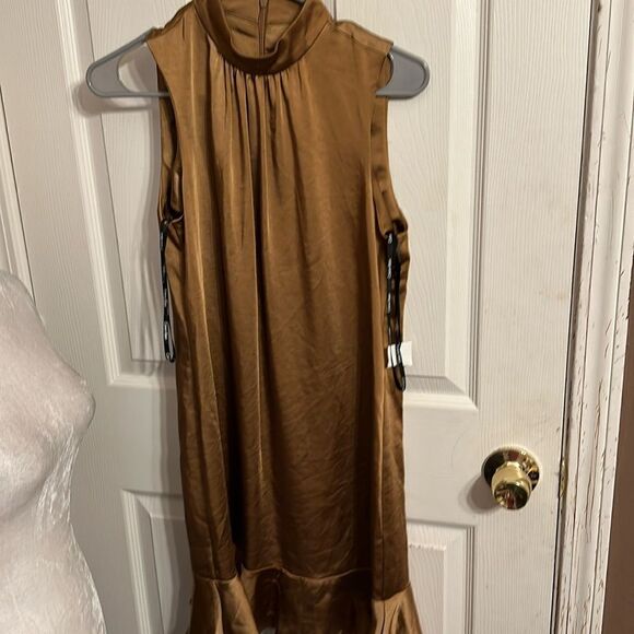 Calvin Klein Dresses & Skirts - Calvin Klein Mock Neck Sleeveless Flounce Hem Dress size 2 NWOT